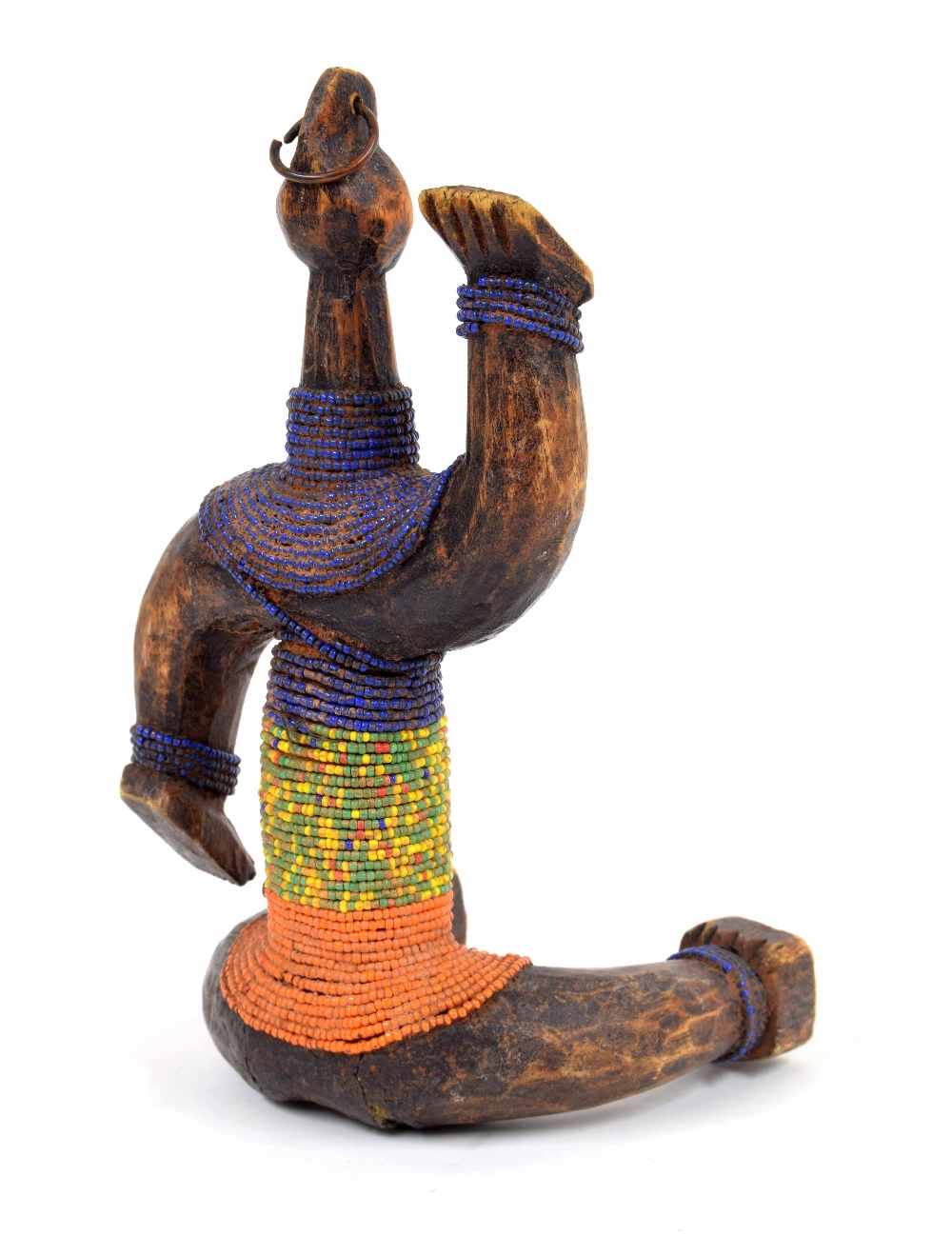 20th century carved Ethiopian Konso figure of a seated gentleman, wearing slim strings of coloured - Image 3 of 4