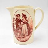 Late 18th/early 19th century English transfer print cream ware jug, iron red print to one side