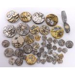 Eleven pocket and fob watch movements to include Waltham, Record, Selezi; together with a quantity