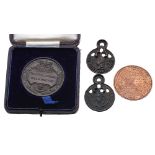 Two Waterbury Watch Company Key-ring puzzle medallions, with five holes and the top with key