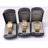 Three Pulsar gold plated and stainless steel gentleman's bracelet watches, silvered dials with