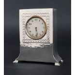 Liberty Arts & Crafts style mantel clock timepiece, the 2" pewter dial within a planished pewter