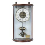 Cluse electric wall clock the 6.5" white chapter ring enclosing a skeletonised centre with centre