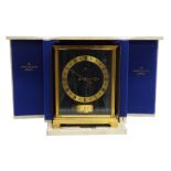 Jaeger-LeCoultre Atmos mantel clock, the 5" brass chapter ring fixed to a malachite dial plate,