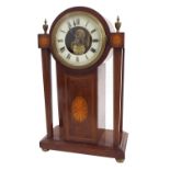 Eureka electric mantel clock, the 4.25" cream chapter ring enclosing a skeletonised centre inscribed