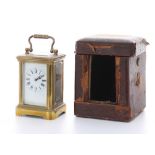 French miniature carriage clock timepiece, within a corniche brass case, 4" high; with outer Morocco