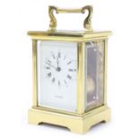 H. Samuel carriage clock striking on a bell, within a corniche style brass case, 7" high (key)