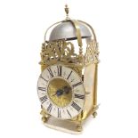 Interesting English brass hook and spike lantern clock, signed Roger Moor, Ipswich to the foliate