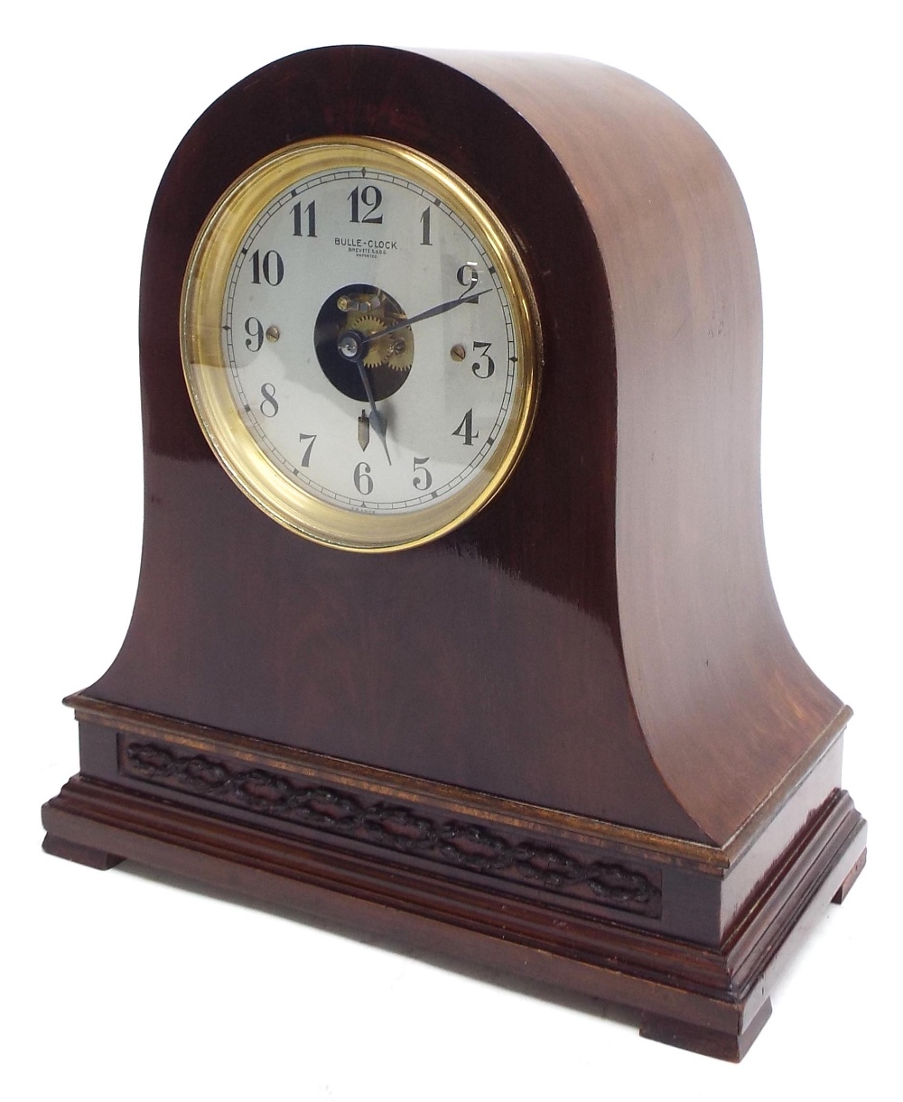 French mahogany electric mantel clock, the 4.5" silvered dial with skeletonised centre signed