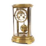 French oval brass four glass two train mantel clock, the S. Marti movement also stamped C.R within a
