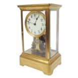 Eureka Clock Co Limited four glass electric mantel clock, the 4.25" cream dial over the movement and
