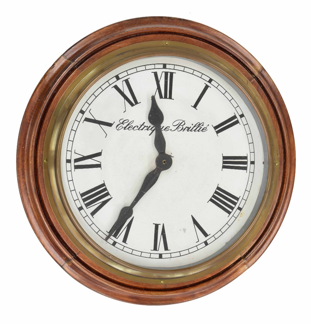 Electrique Brillie 12" slave dial wall clock within a stained wooden turned surround