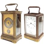 Carriage clock with alarm and striking on a bell, within a corniche brass case, 5.75" high, also