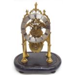 Brass single fusee skeleton clock, the 4.5" silvered chapter ring signed A.B. Savory & Sons,