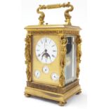 Fine French gilded brass Grande Sonnerie calendar carriage clock with alarm, the movement back plate