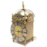 Antique English brass lantern clock, the 6.5" silvered dial enclosing a foliate engraved centre