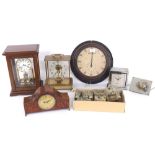 Seth Thomas electric torsion style clock, within a four glass wooden case, 12" high, Keinger &