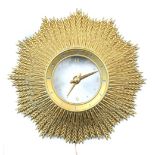 Electric sunburst wall dial, inscribed verso 'Golden Wheat, with the mystery thru illuminated
