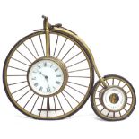 Novelty brass clock/barometer in the form of a penny farthing bicycle, the principal 3.5" clock dial