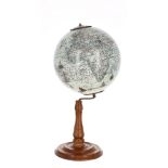 Reproduction small table rotating globe, supported upon a baluster turned column and circular