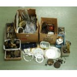 Large quantity of old clock parts and fittings, including carriage clock parts, bezels, barrels,