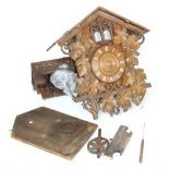 Black Forest two train cuckoo clock in need of restoration, the 6.25" dial within a chalet case