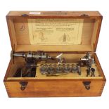 Small Boley & Leinen watchmakers lathe with accessories, within a fitted oak hinged case, 13" wide