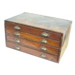 Pine chest of four long drawers containing a quantity of old platform escapements, various small