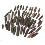 Large quantity of various large and small Black Forest clock weights (over forty)