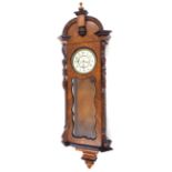 Figured walnut double weight Vienna regulator wall clock, the 6.75" cream dial with subsidiary