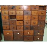 Victorian mahogany bank of drawers, comprising thirty small drawers (two missing) over eight