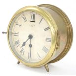 Interesting bronze trench art ship's bulkhead clock, the 7" white dial signed Smith Eight Day,