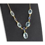 Sapphire and aquamarine 14k yellow gold necklace, with five oval aquamarines estimated each 1.