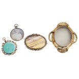 Victorian pinchbeck revolving locket brooch, 70mm; oval onyx brooch, 49mm x 37mm; also two gilded