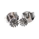 Pair of modern 9ct white gold diamond stud earrings, 4mm