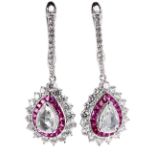 Superb pair of white gold ruby and diamond drop earrings, each with central pear shaped old-cut