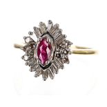 18ct ruby and diamond cluster ring, the marquise ruby in a surround of baguette and round