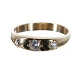 18ct three stone old-cut diamond ring, 0.26ct approx, band width 5mm, 4gm, ring size P