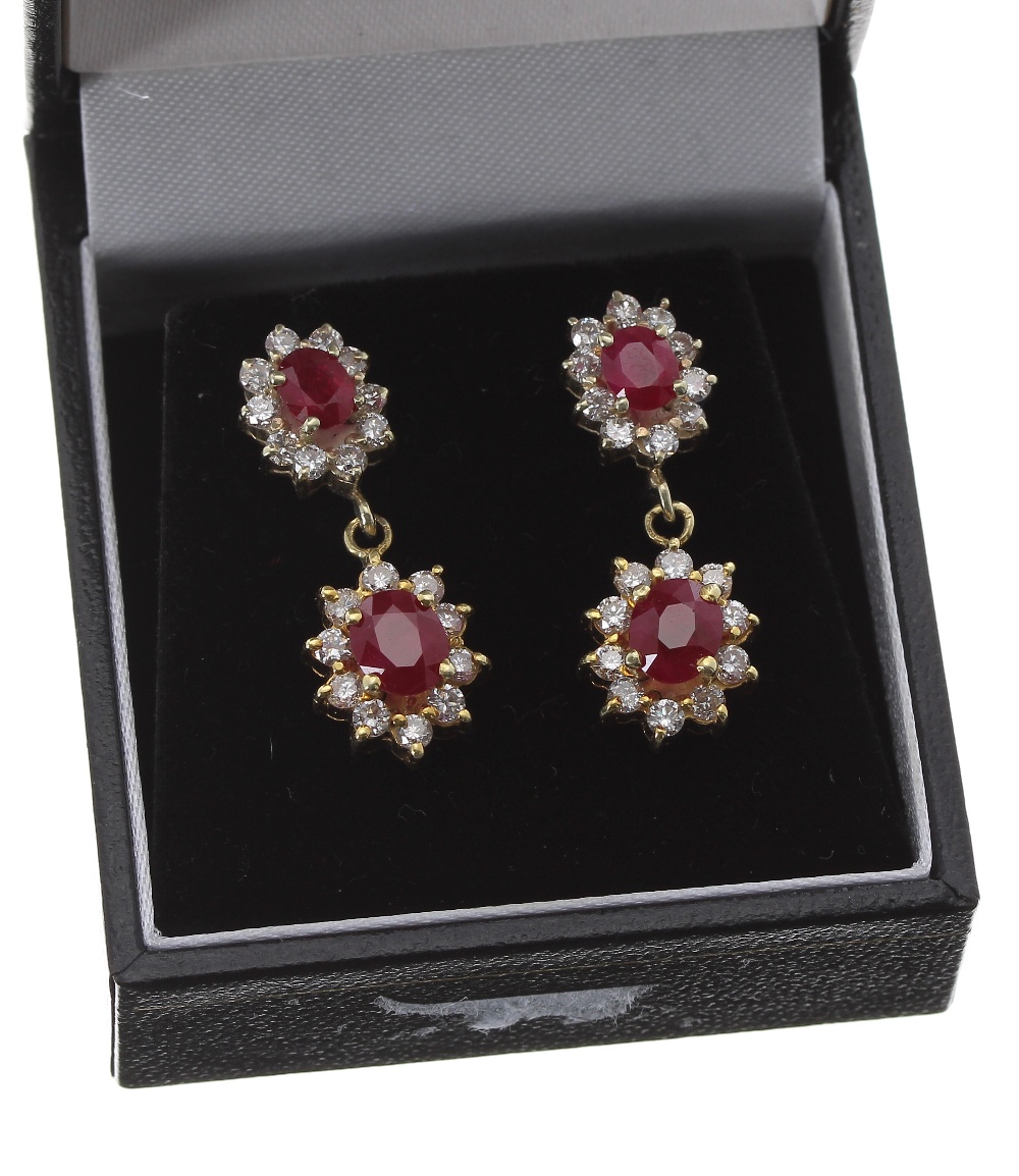 Fine pair of 18ct ruby and diamond drop earrings, each with two graduated oval clusters with a - Image 2 of 2