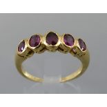 Attractive 18ct five stone amethyst ring, ring size O/P, 5.1gm