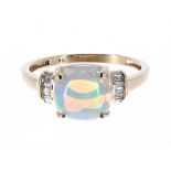 9ct opal and diamond ring, the cabouchon opal 2.20ct approx, with baguette-cut diamonds to either