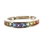 Modern 9ct multi-gem seT half eternity ring, band width 4mm, 2.2gm, ring size M/N