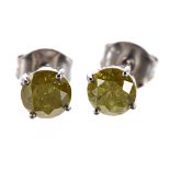 Pair of 9ct white gold fancy yellow diamond stud earrings, round brilliant-cuts, 1.00ct approx in