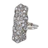 Impressive Art Deco platinum old-cut diamond plaque ring, with three central principal diamonds in a