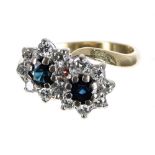 18ct sapphire and diamond double cluster ring, each set with a single sapphire in a surround of