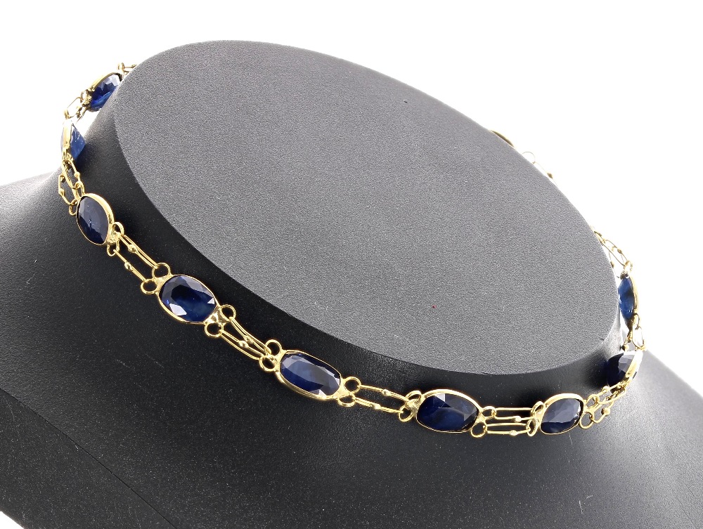 14k yellow gold sapphire bracelet, set with twelve oval sapphires, estimated 0.35ct approx, 2.2gm,