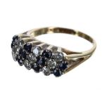 18ct sapphire and diamond cluster ring, set with nine diamonds and ten sapphires, 4.4gm, band