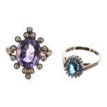 9ct amethyst and seed pearl yellow gold ring, the oval amethyst in a surround of fourteen seed