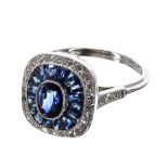 Platinum sapphire and diamond ring, set with an oval central sapphire, 0.62ct approx, a halo setting