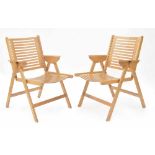 Good pair of Niko Kralj design 'REX' folding lounge chairs, the backs and seats of pierced ply